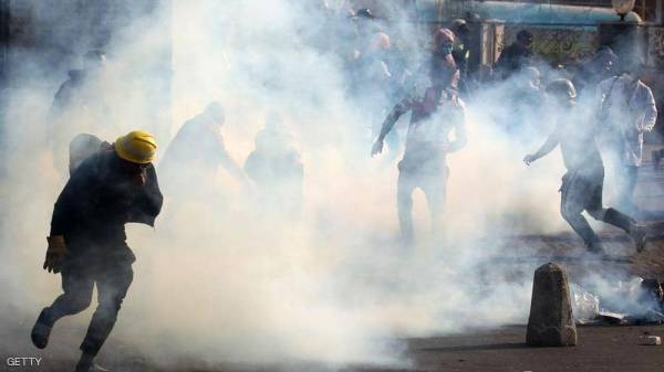  سيارات مدنية تطلق النار على متظاهرين في بغداد